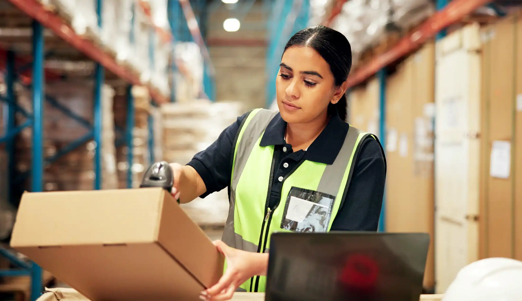 woman with barcode on box for supply chain